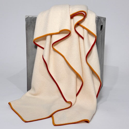 Fine Purl Knit Cashmere Throw in Cream with Fire Brick & Gold Hangai Mountain Textiles 