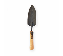 Load image into Gallery viewer, Straight on view of a garden trowel with wooden handle.
