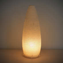 Load image into Gallery viewer, An illuminated simple LED torpedo-shaped paper lantern.
