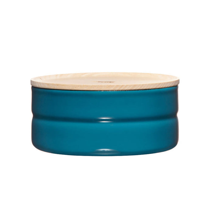 Straight on view of a blue container with a wood top.