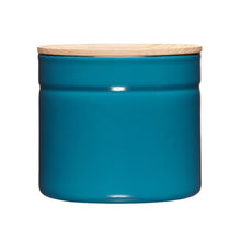 Load image into Gallery viewer, Straight on view of a teal container with a wood top.
