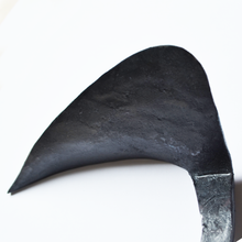 Load image into Gallery viewer, Super closeup view of a metal blade shaped similar to a duck&#39;s head. 
