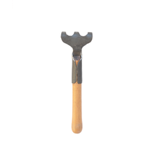 Load image into Gallery viewer, Rear view of a metal 3 tine garden rake with wooden handle.
