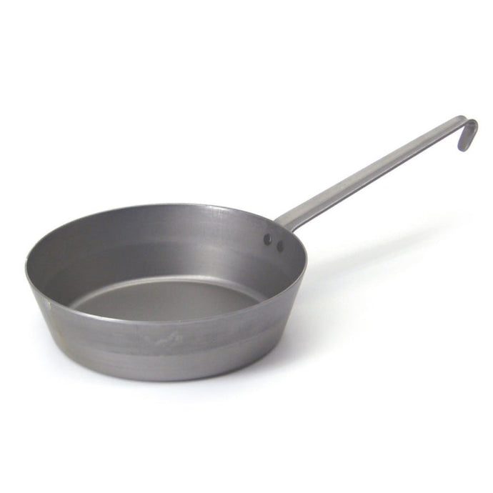 Angled side view of a grey iron cooking pot with metal handle.