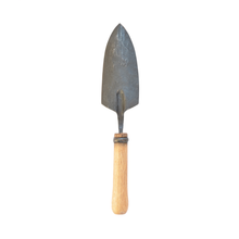 Load image into Gallery viewer, Straight on image of underside of a garden trowel with a wooden handle.
